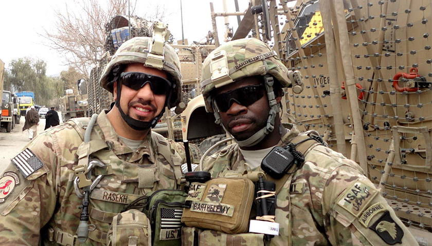 Staff Sergeant Kevin Barthelemy (right) and a fellow US Army officer on site in Afghanistan