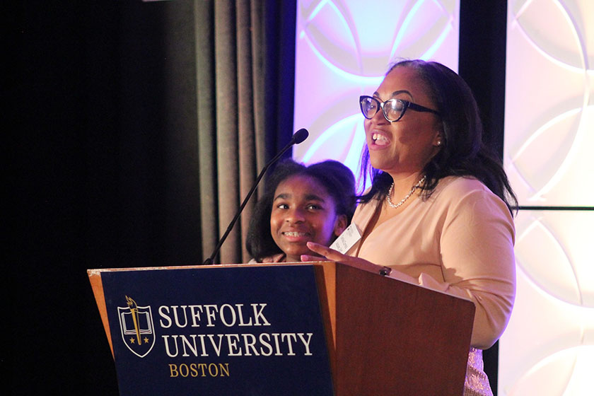Tamika Correia Jacques, BS '97, accepts her award