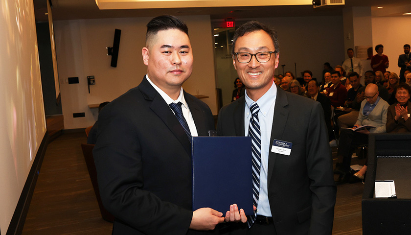 Harry Dow Scholarship Award recipient Seung Won Frank Lee and Suffolk Law Vice Dean Patrick Shin