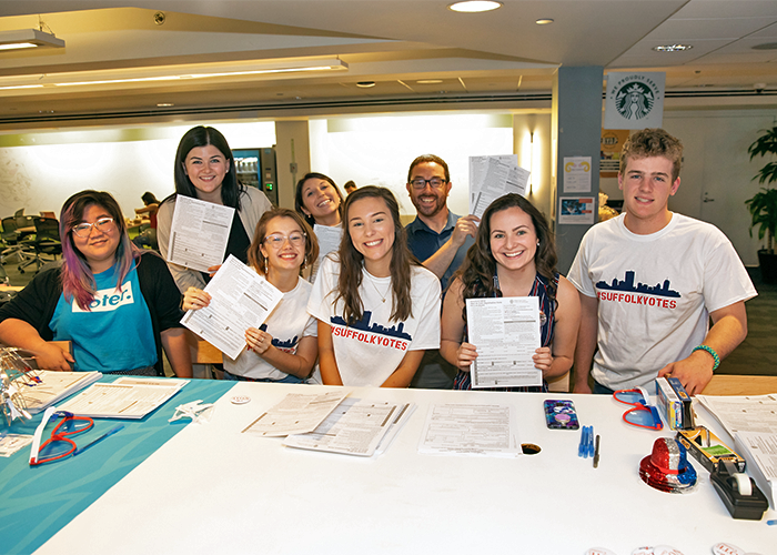 A group of students volunteering at a Suffolk Votes event to promote voter registration