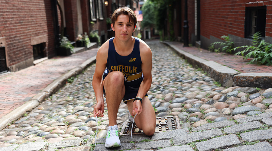 Suffolk student-athlete Kely goes for a run on Acorn Street.