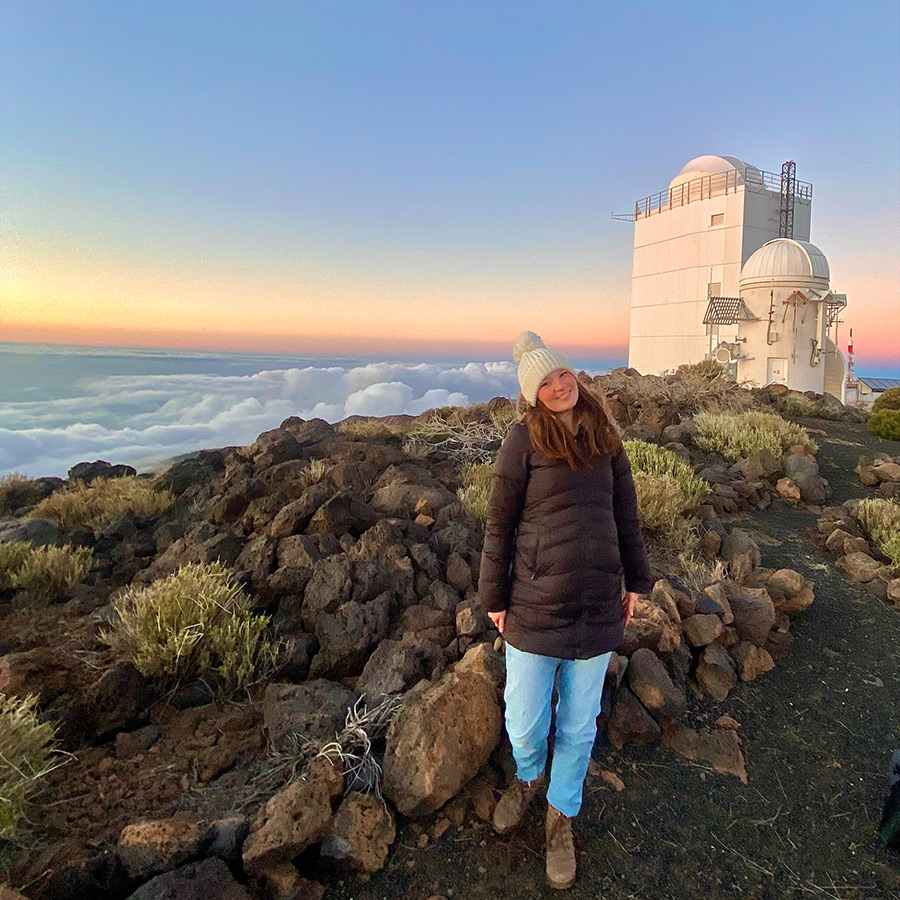 Suffolk student Alyssa poses for a portrait outside the Observatory in the Canary Islands in Spain.