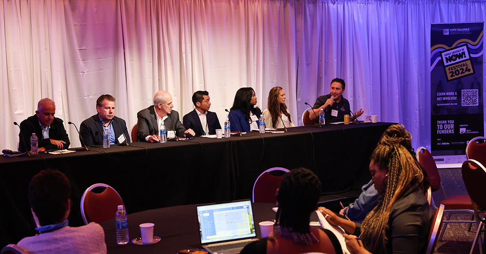 Suffolk University faculty and staff speak at a SEED panel