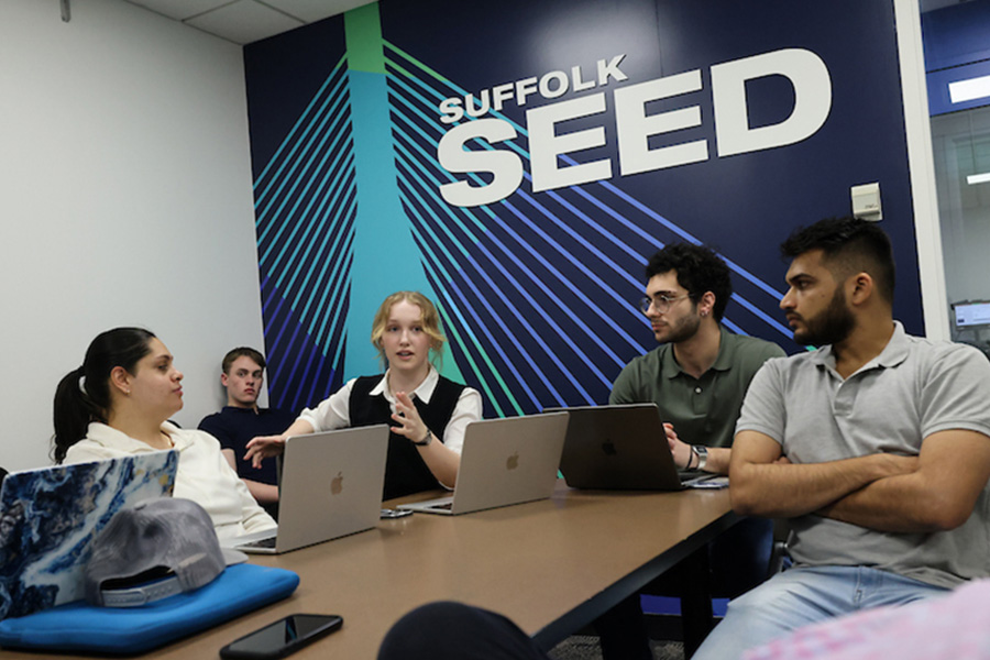 Suffolk students in discussion in one of the SEED conference spaces.