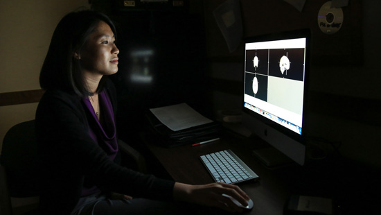 Psychology student working on a computer. 