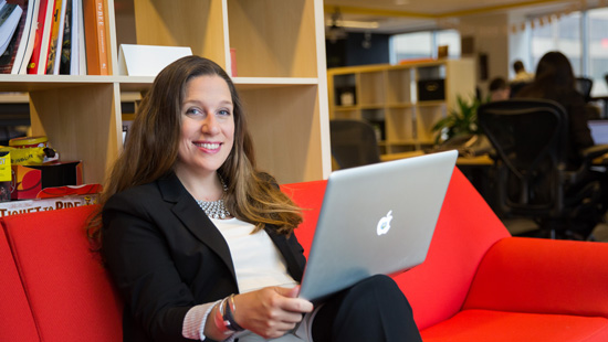 Senofer Mendoza working on a computer. 