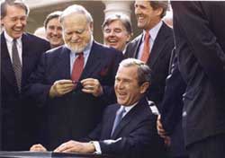 President Bush signs bill naming the federal courthouse for Moakley.