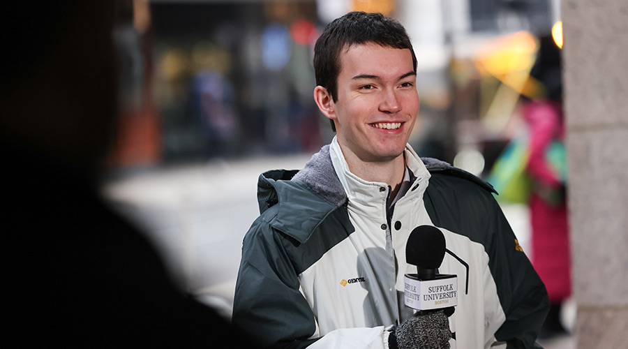 Suffolk student Jacob does a live broadcast from Studio 73.