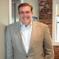 Headshot of George Moker.