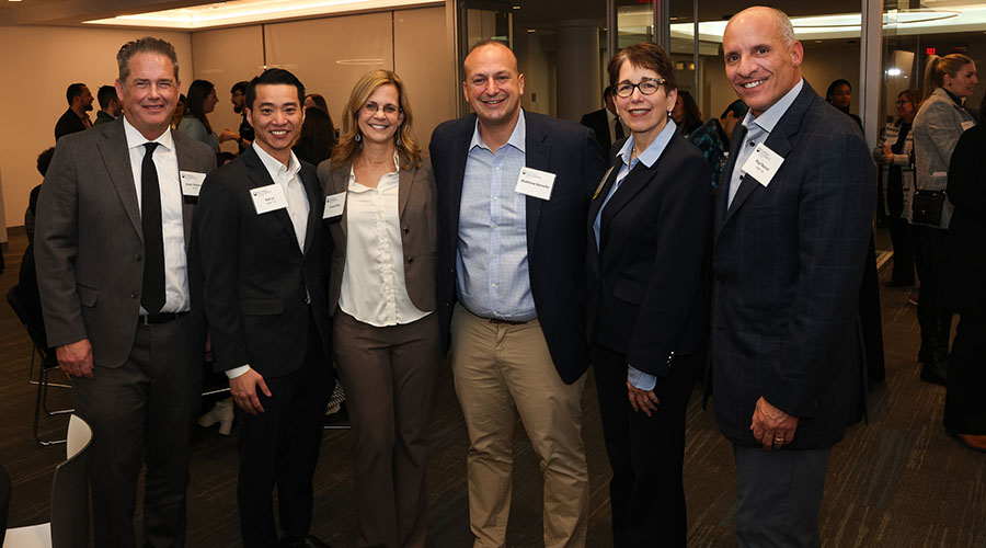 President Kelly, Tracey Riley and Dat Le BSBA ’12, MSA ’13; Craig King, BSBA ’81; Stephen MacDonald, MBA ’02; and Paul Nasser, MBA ’98