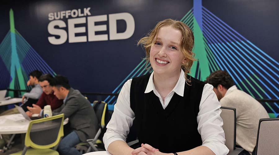 Suffolk student Grace Walsh poses for a photo in the SEED Collaborative space on Campus.