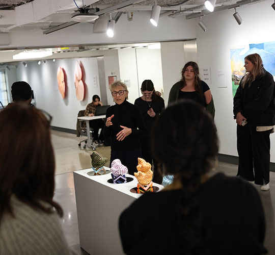 Students at a gallery art show