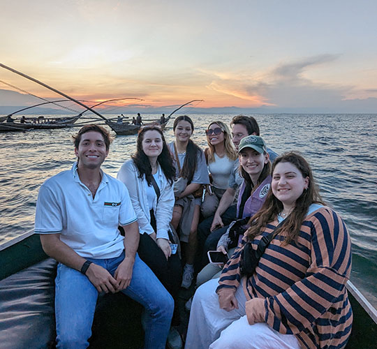 Students on boat in Boston Harbor