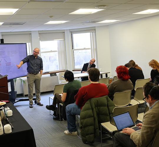 PPE Professor lecturing to his students