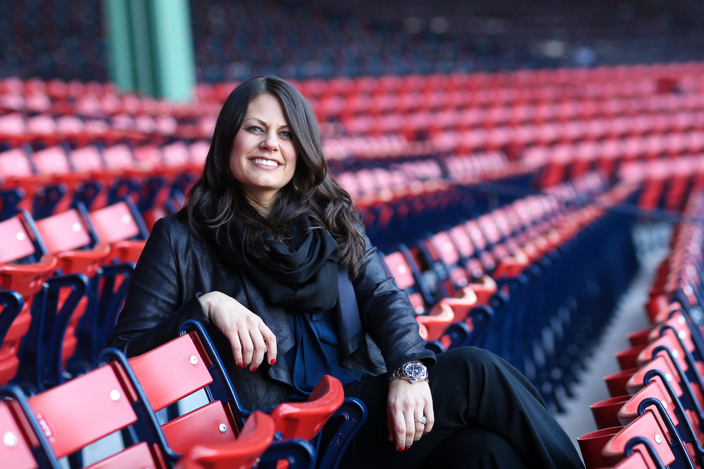 Suffolk alum sitting in the stands at Fenway Park. 