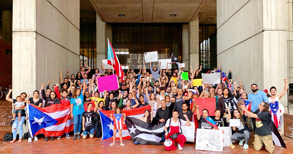 Suffolk student Gabriela Soto Cotto with a group of community organizers for Puerto Rico advocacy.