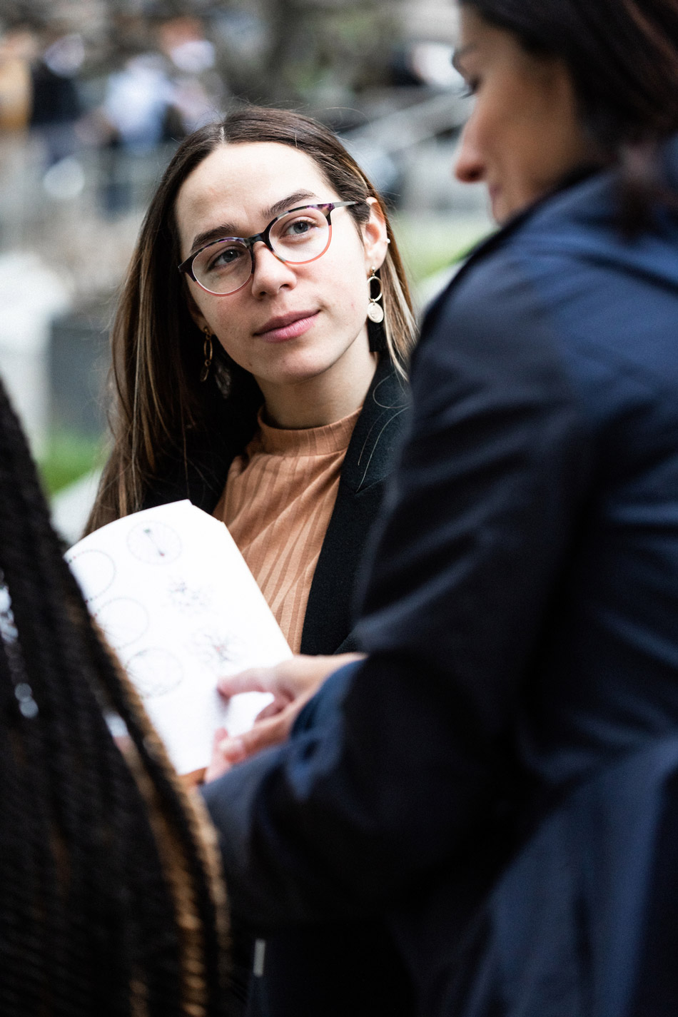 Suffolk student Gabriela Soto Cotto listening to a professor.