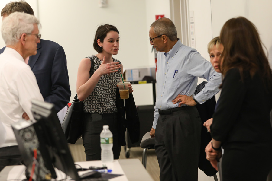 Maggie Randall talking with former White House Chief of Staff Jon Podesta.