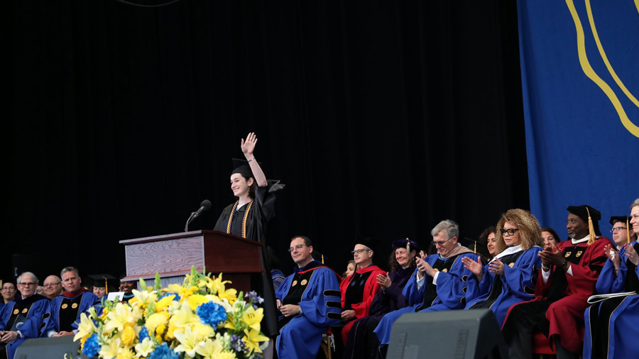 Maggie Randall delivering the an address to her classmates at Commencement.