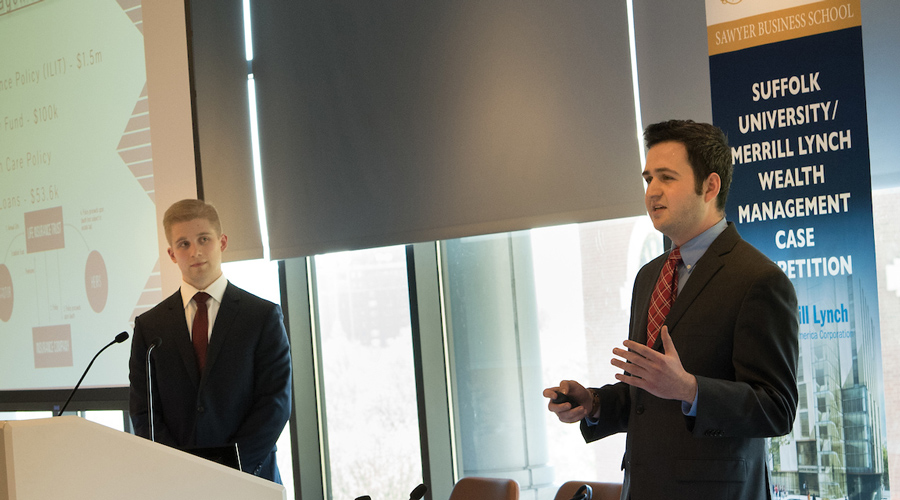 Vincent LePore giving a presentation at a Sawyer Business School wealth management symposium.