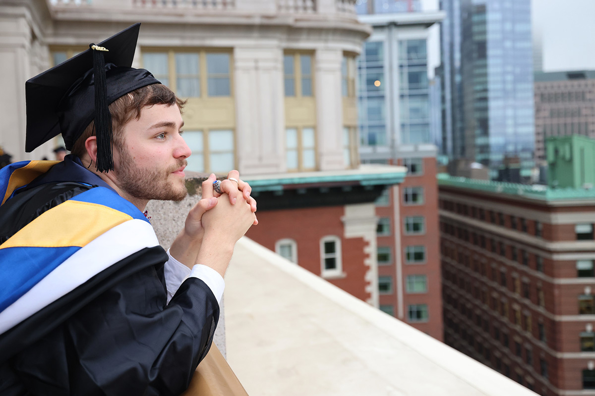 Suffolk student Hunter poses for a portrait.