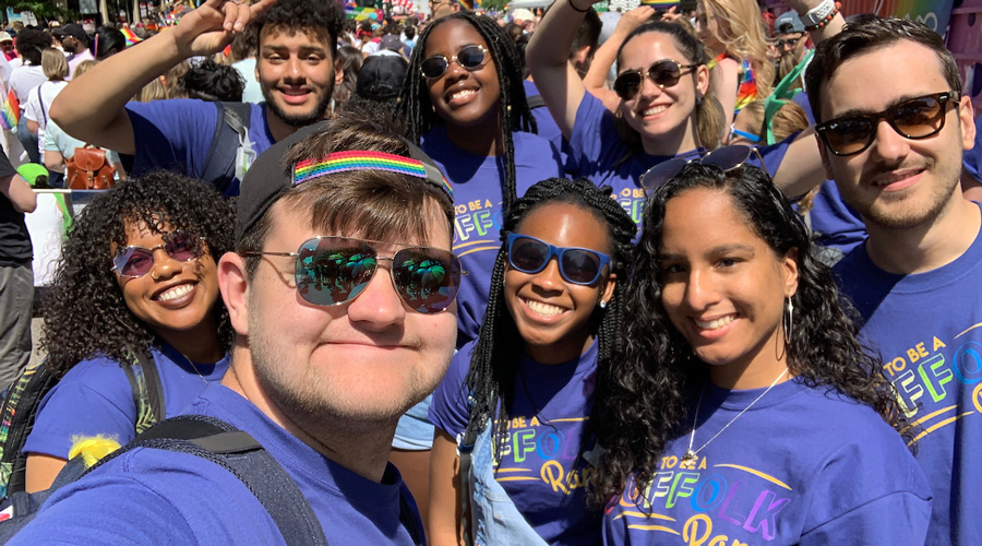 Suffolk student Patrick Lovelace takes a picture with friends at the Pride Parade in Boston.