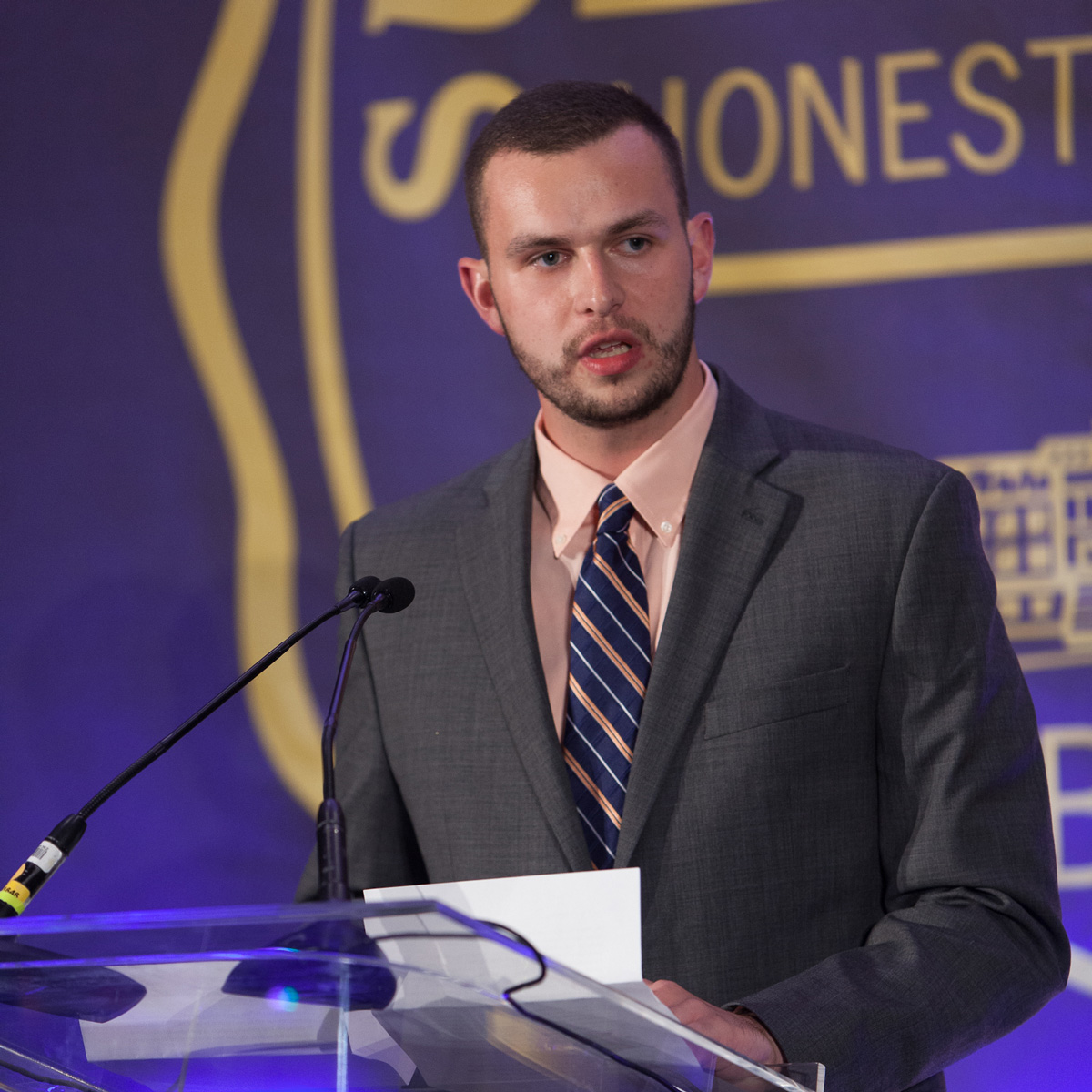 Sean addressing the guests from the podium at Commencement Eve Dinner.