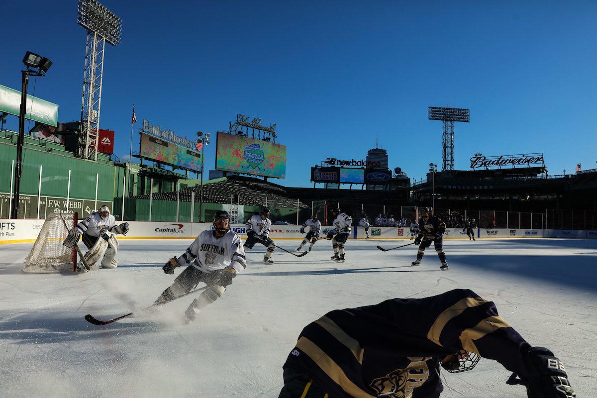 The Suffolk Men's Hockey team participates in a special exhibition game inside Fenway Park.