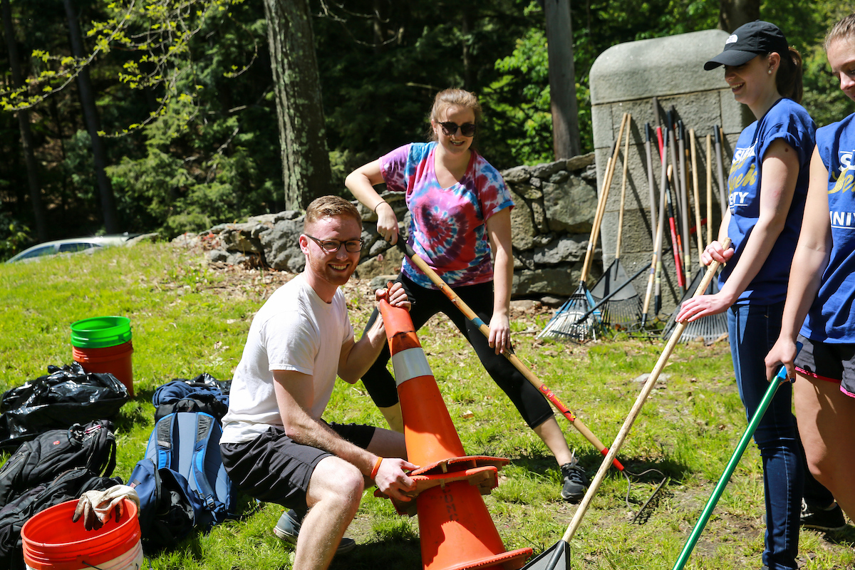 Suffolk University Senior Service Day at Bussey Brook Meadow in Jamaica Plain, Boston