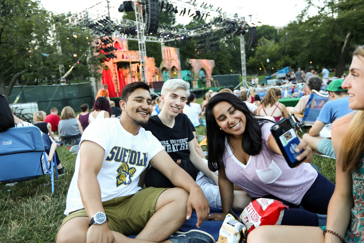 Suffolk students watching a Shakespeare on The Common performance in Boston