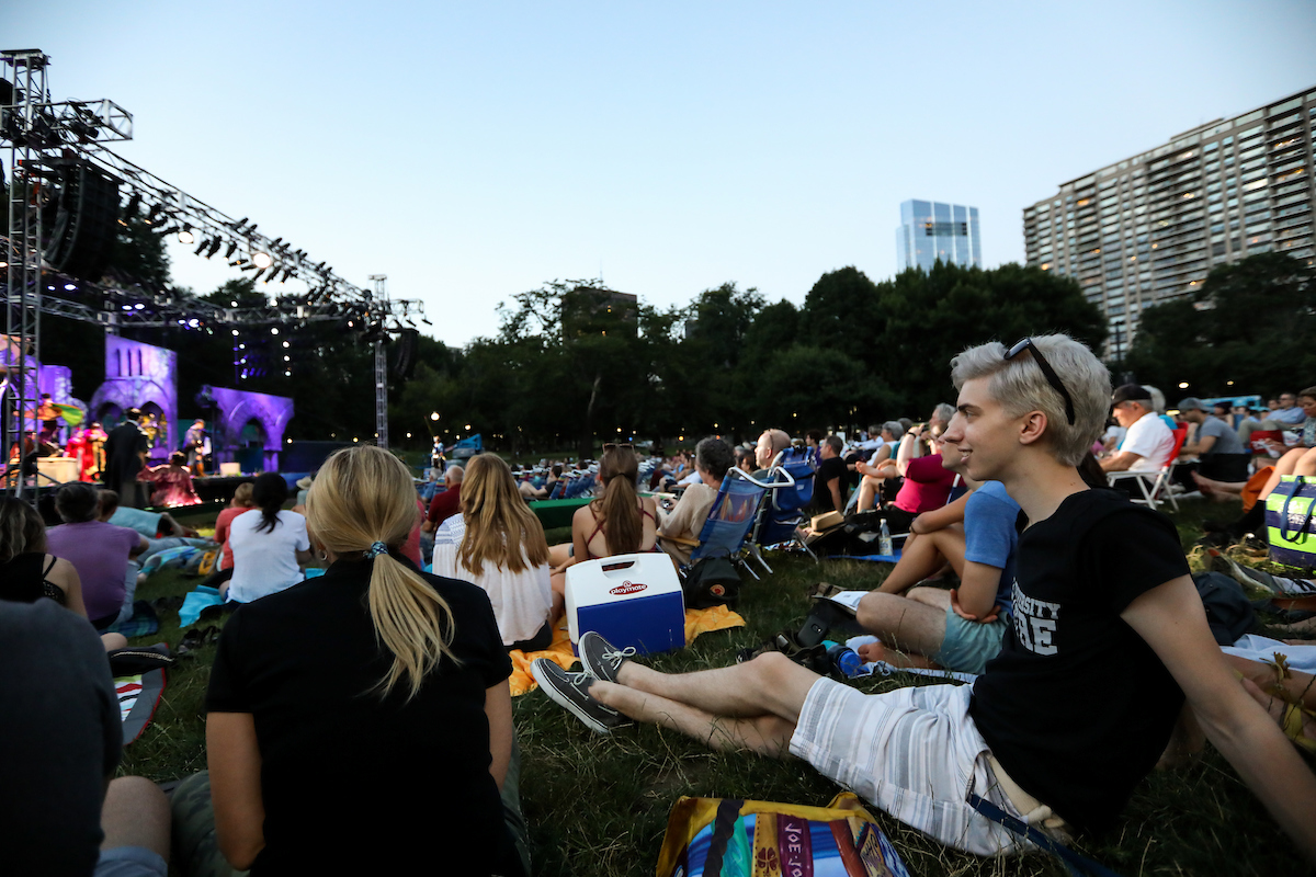 Suffolk students watching a Shakespeare on The Common performance in Boston