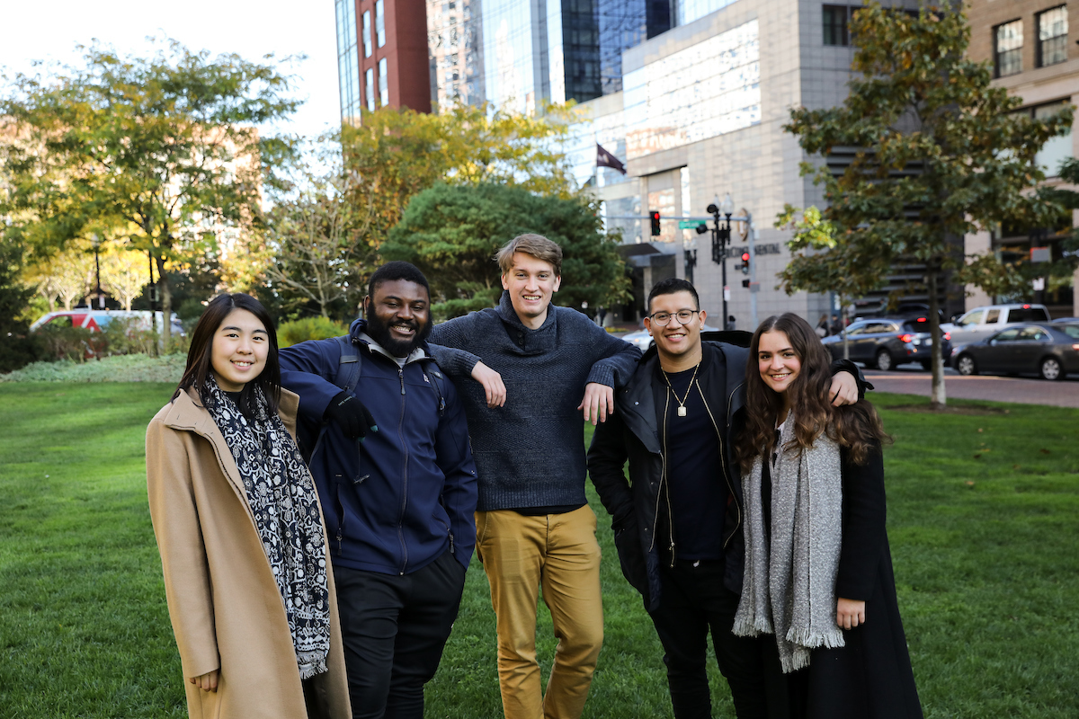 Suffolk students walk around in Boston's Rose Kennedy Greenway area.