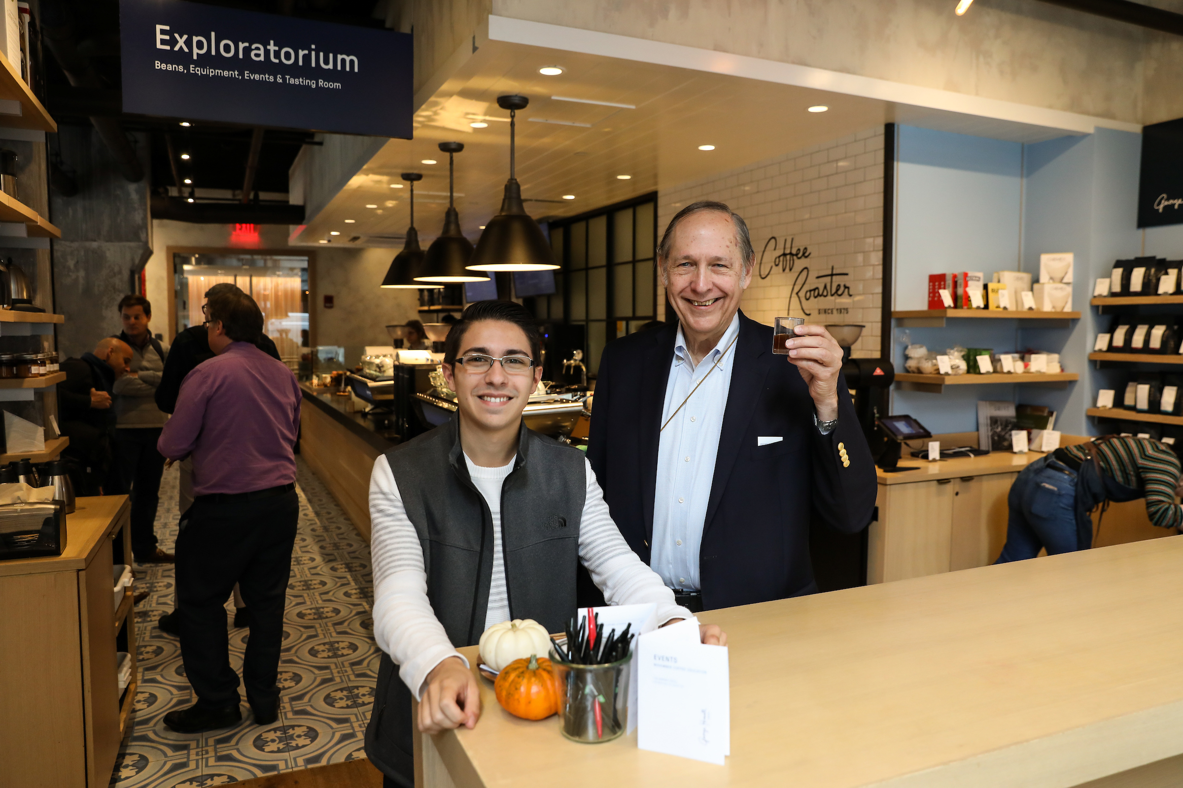 Suffolk students work with Boston-based artisanal coffee roaster George Howell during an experiential marketing class.