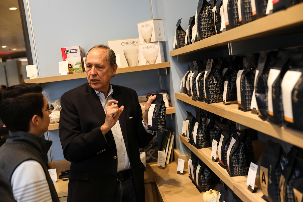 Suffolk students work with Boston-based artisanal coffee roaster George Howell during an experiential marketing class.