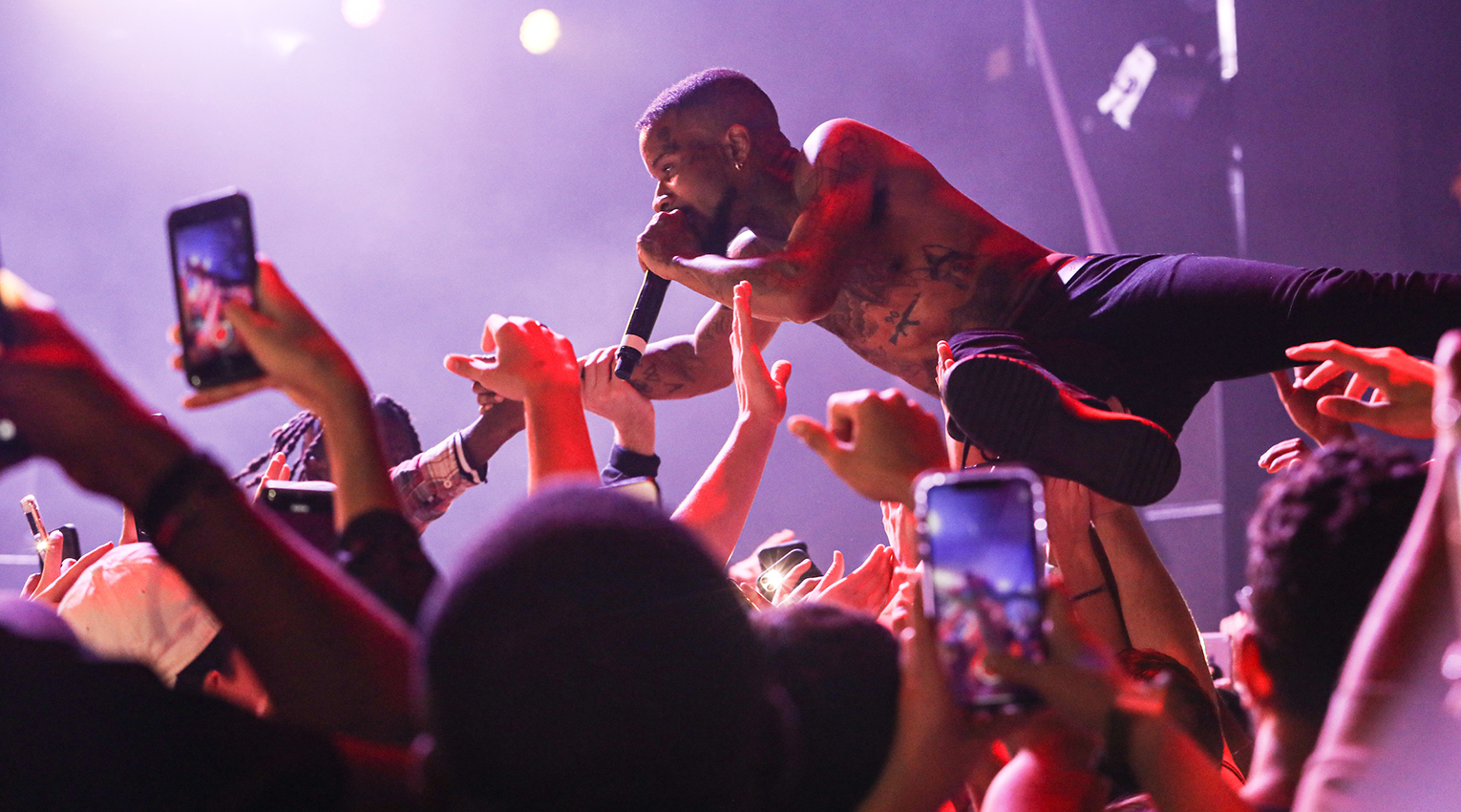 Rapper Tory Lanez crowdsurfing during his performance at Suffolk's Fall concert