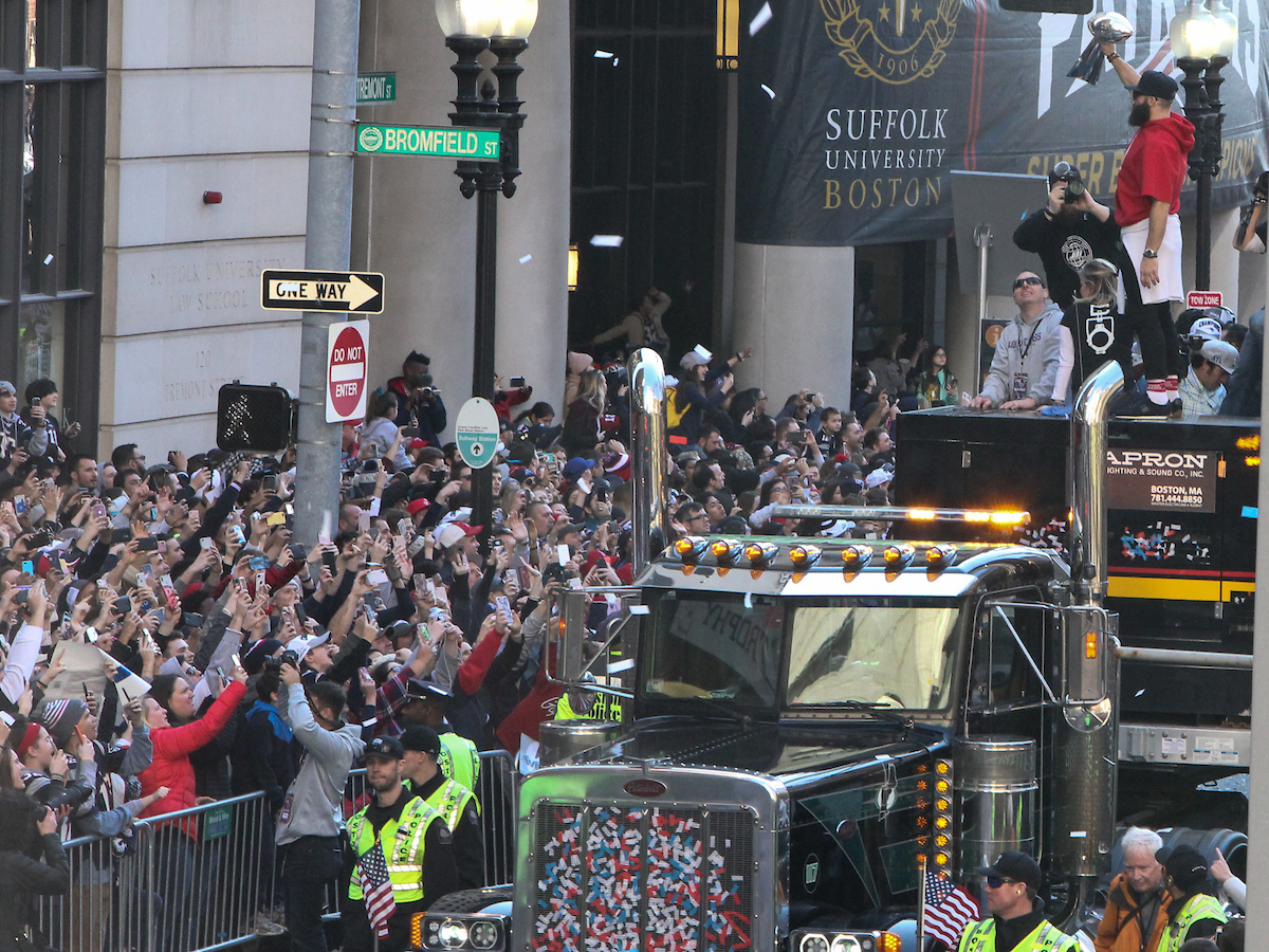 Julian Edelman on the Duck Boat, pointing out to the Suffolk crowd at the parade.