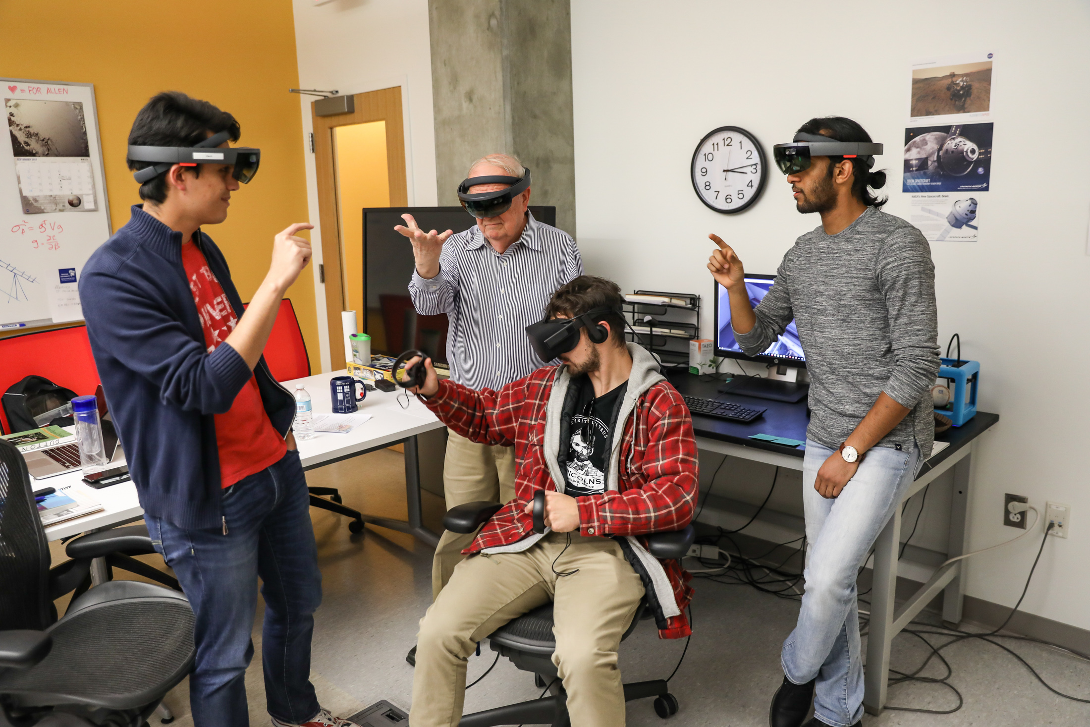 Students and professor using the VR headsets together
