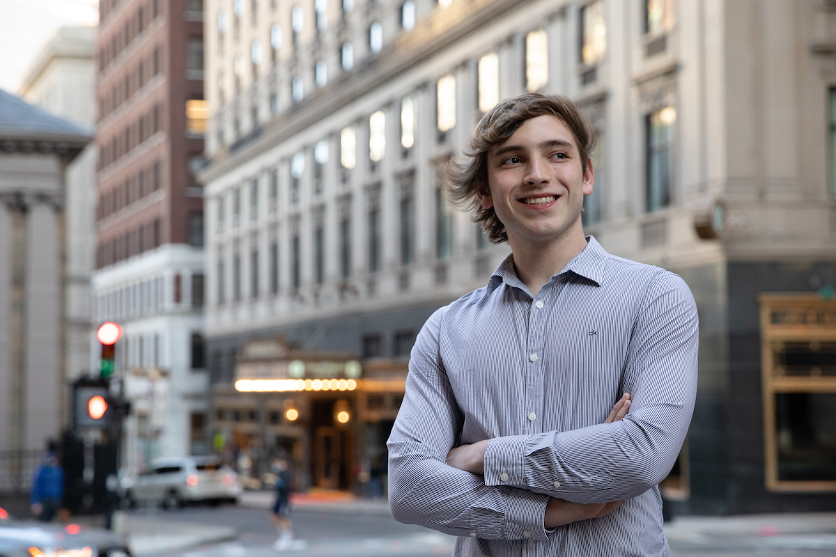Suffolk student Nico poses for a portrait on Tremont Street in Boston.