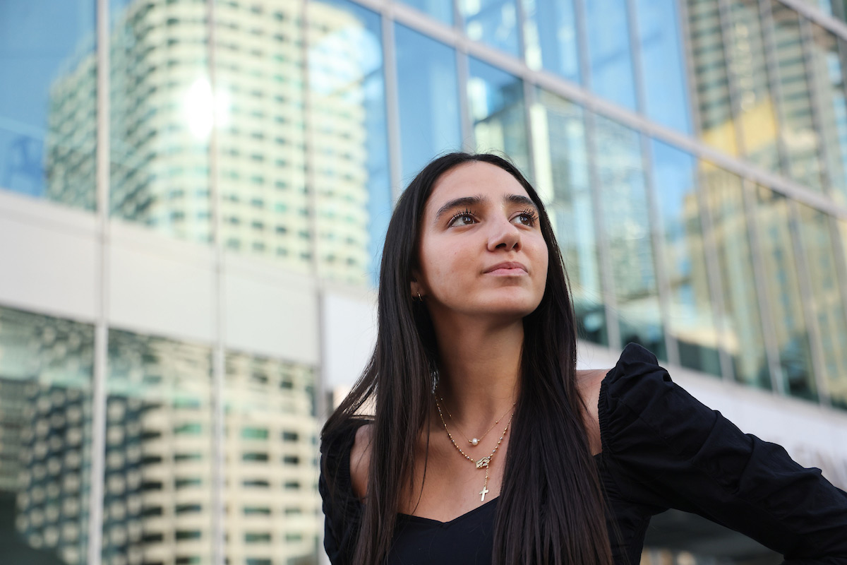 Suffolk student Angela poses for a photo near South Station in Boston.