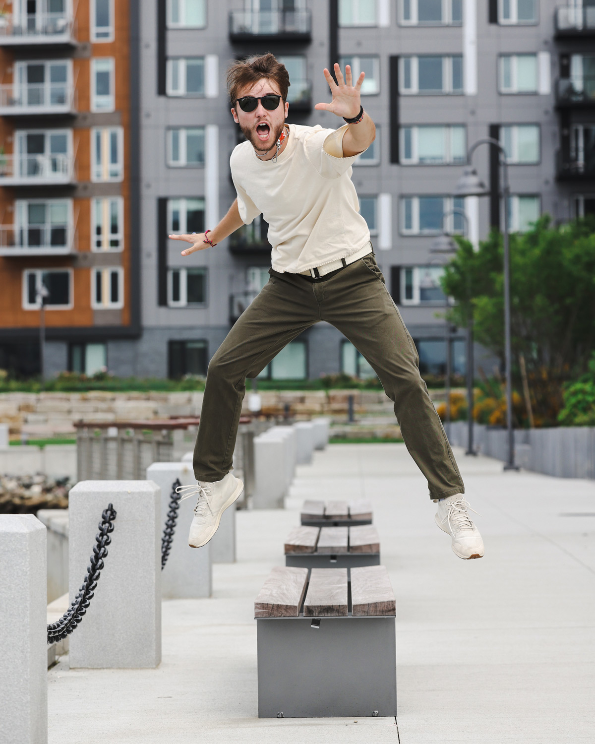 Suffolk student Hunter jumps for a photograph in East Boston.