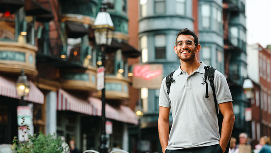Suffolk student Mohammed poses for a portrait in the North End of Boston.