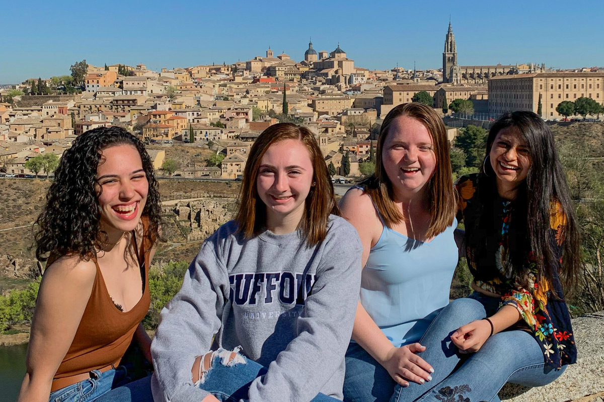 Suffolk student Jocelyn takes a picture with friends in Madrid, Spain.