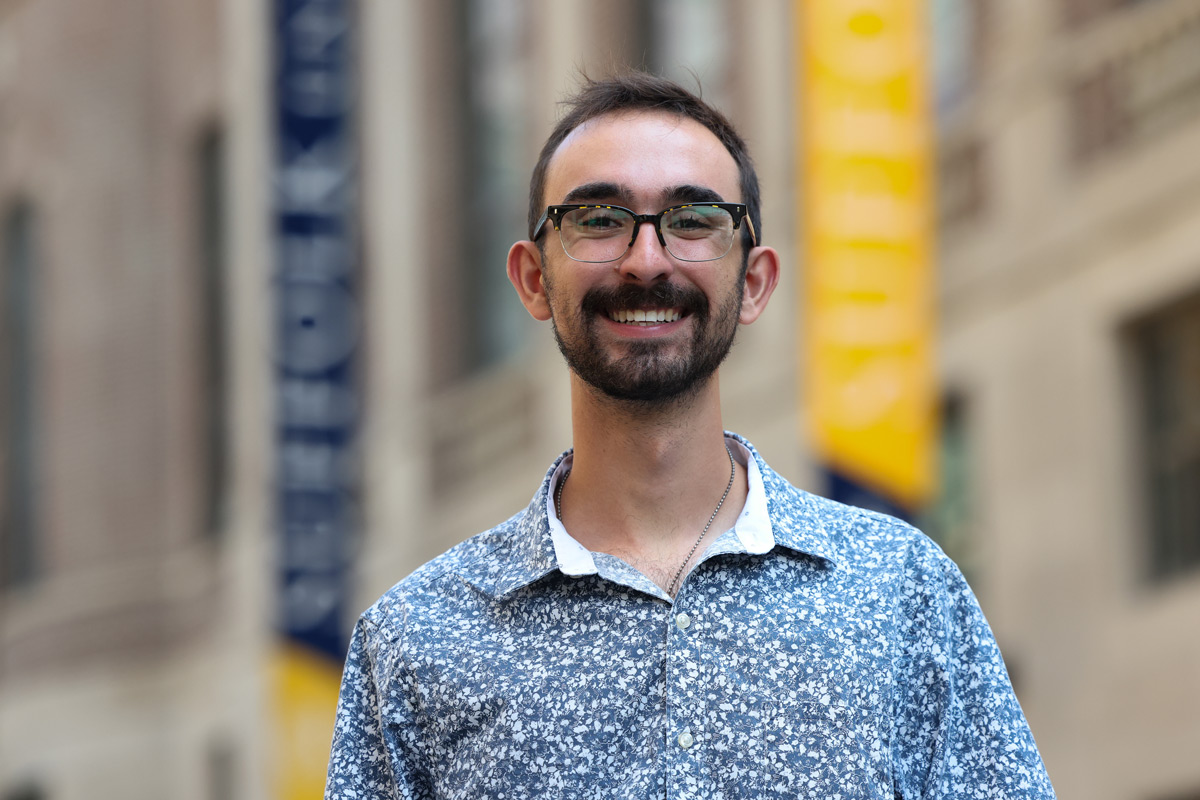 Suffolk student Matt poses for a portrait outside the Sawyer Building in downtown Boston.