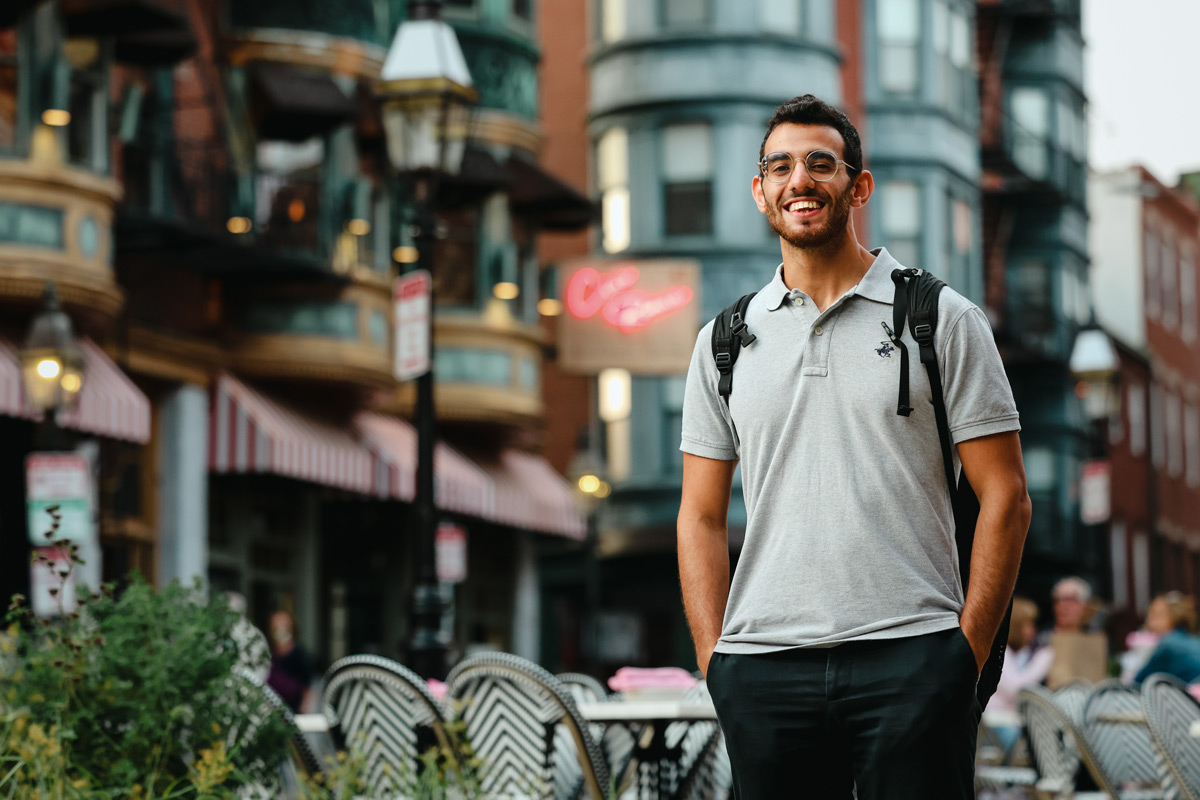 Suffolk student Mohammed poses for a portrait in Boston's North End.