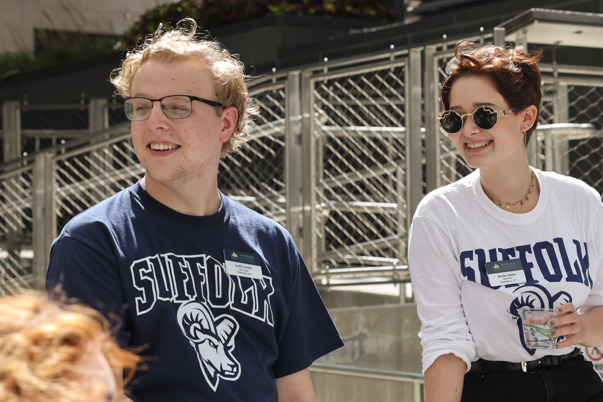 Suffolk student Collin stands with a friend during an event on Roemer Plaza in Boston.
