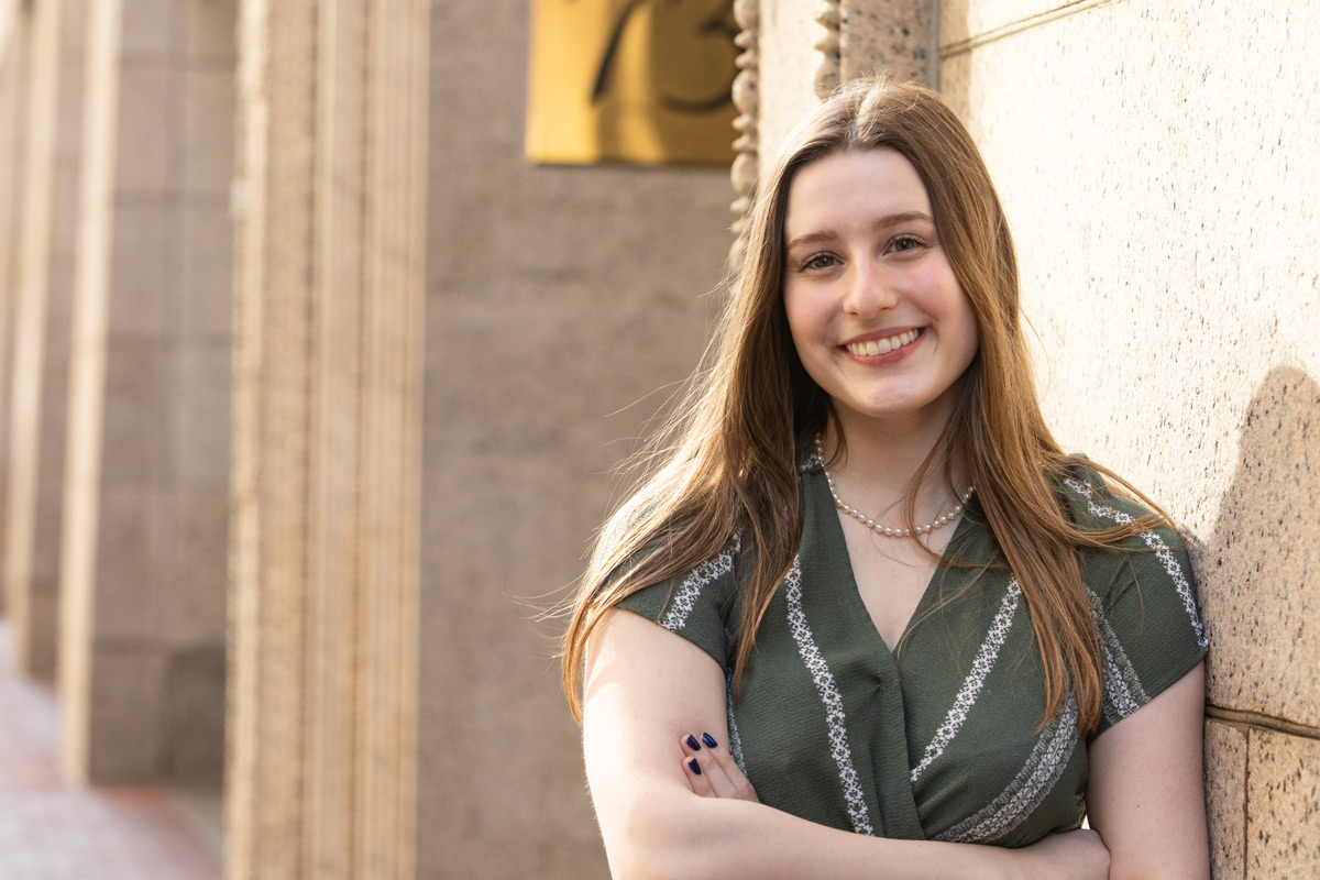 Suffolk student Morgan poses for a portrait outside the Rosalie K. Stahl building in Boston.