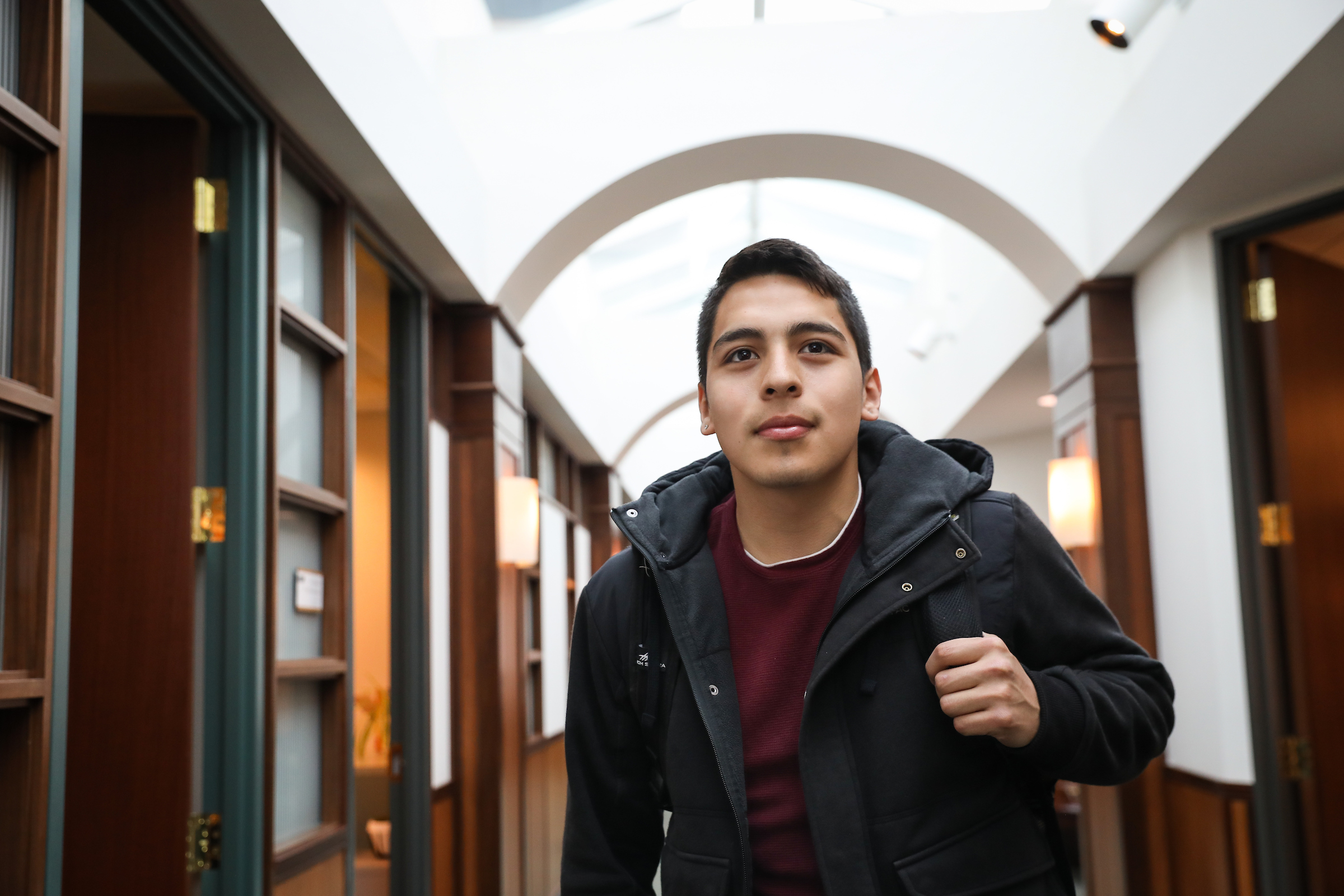 Suffolk student Kevin Luna-Torres poses for a photo.