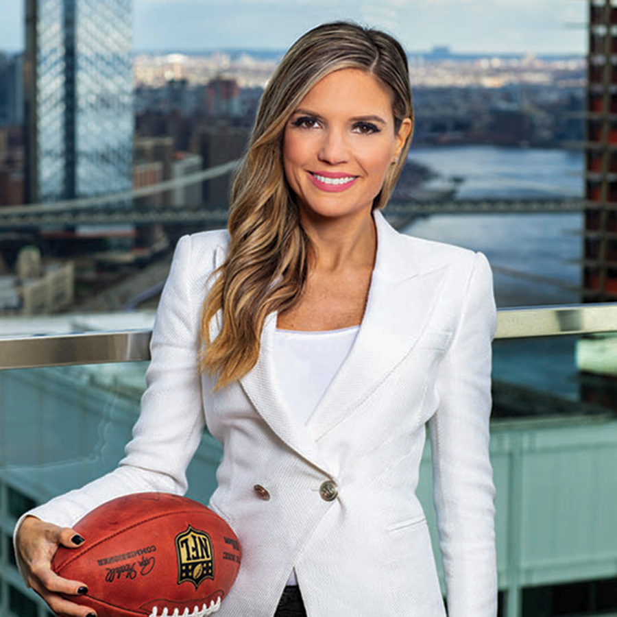Kim Miale posing with football
