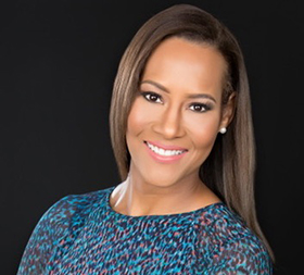 Headshot of Suffolk Alumna Marie-Louise Skafte, a white woman with long straight brown hair