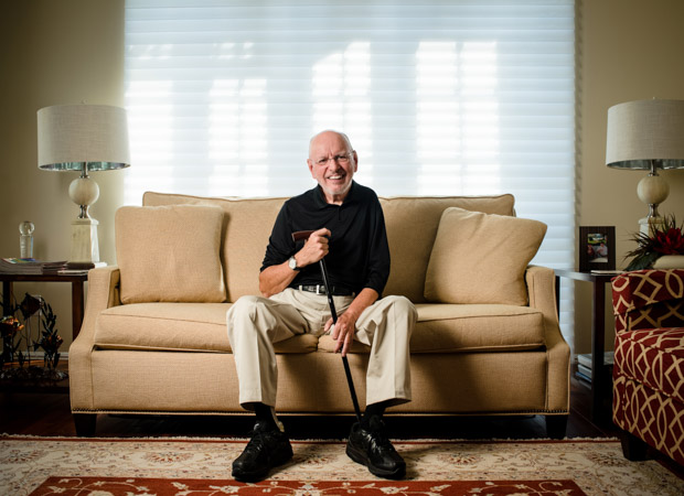 Frank Buckley sitting on a couch